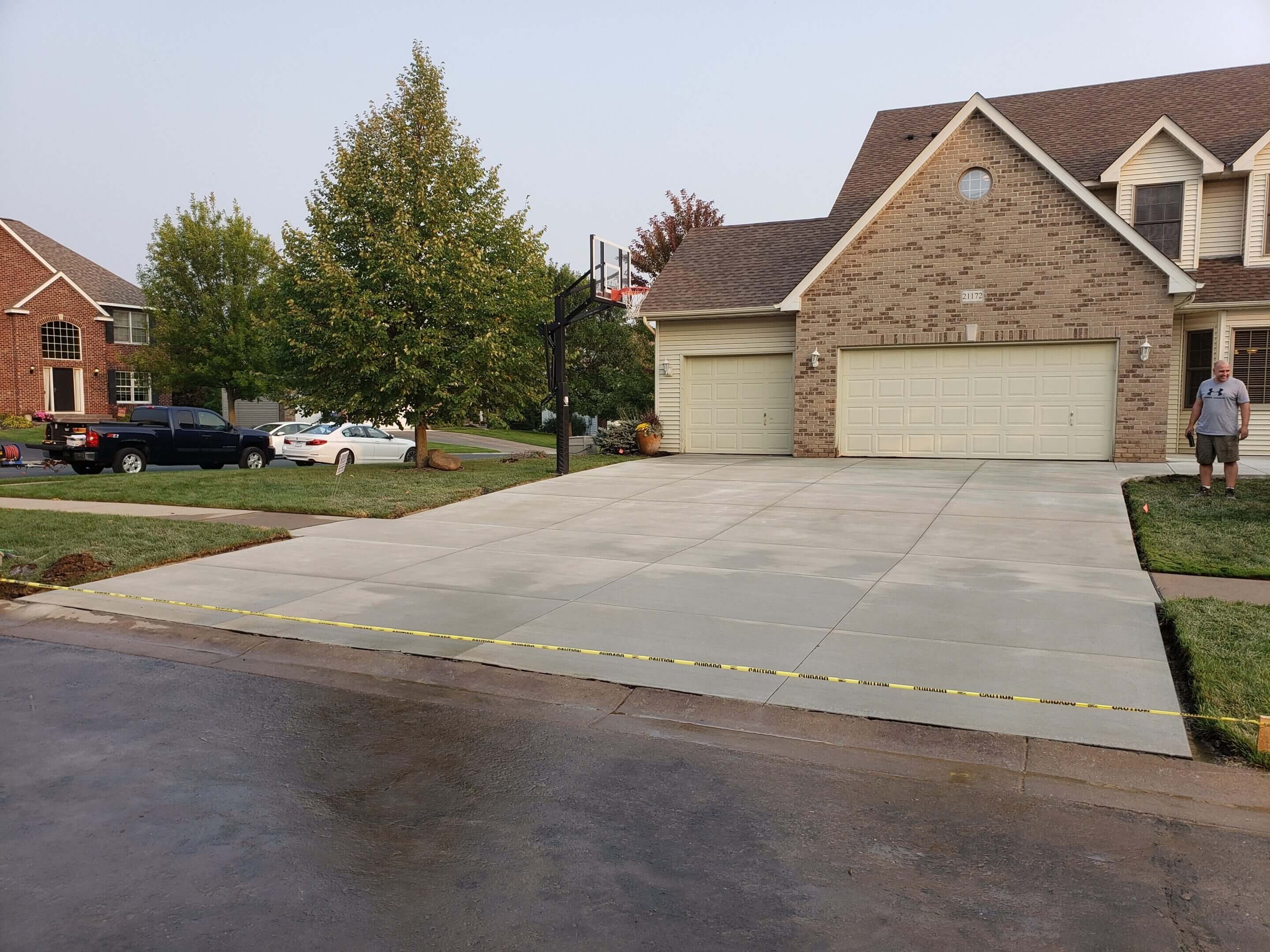 New driveway poured by Golden Valley concrete company - Twin Cities Concrete Works.